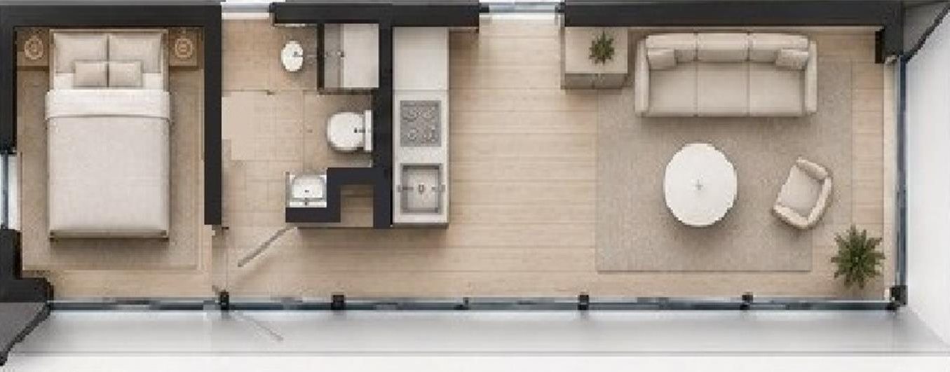 ECHO 26 floor plan: Separate bedroom on the left, a central bathroom and kitchen, and a living area on the right. Furnishings shown for reference.