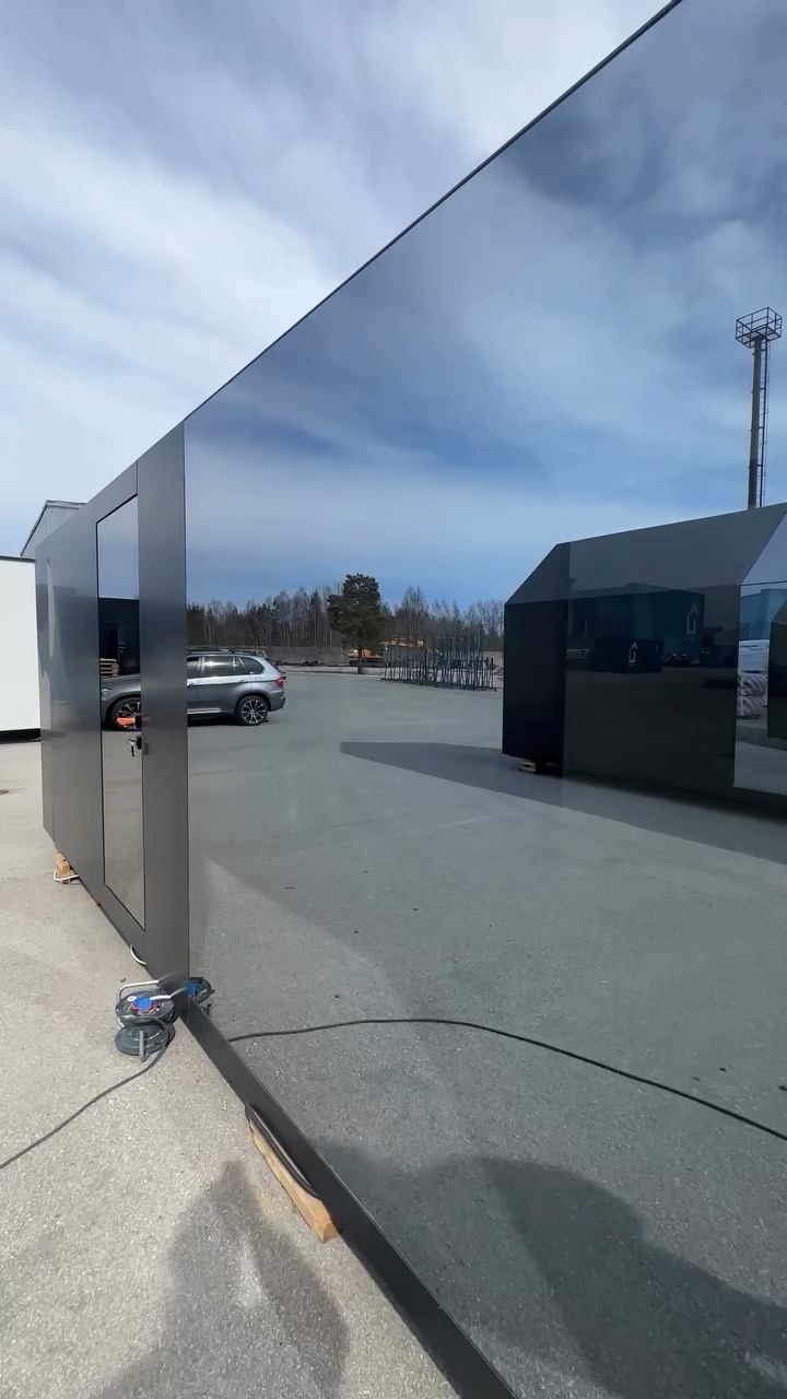 Reflective façade of the NOMAD source cabin at the factory